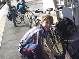 Luke also pumps his tyres at Euston - he had to let them down last night so his thick, chunky tyres would fit into the bike rack on the train